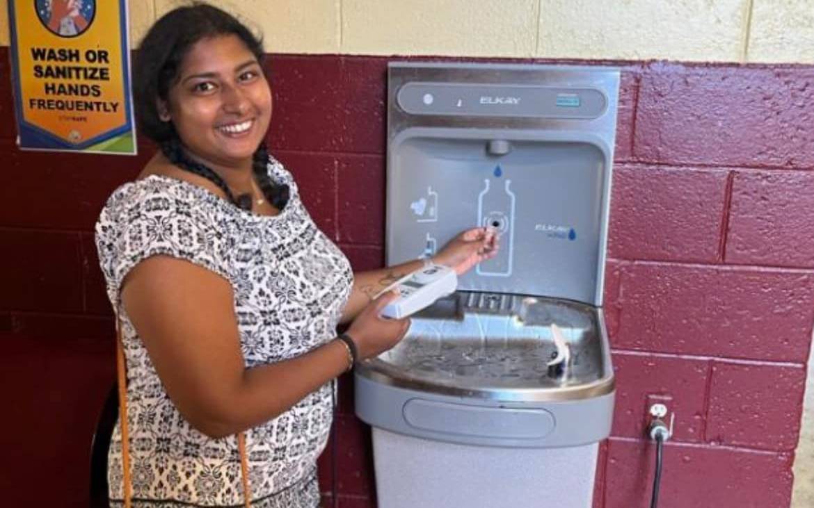 UVI student testing water quality