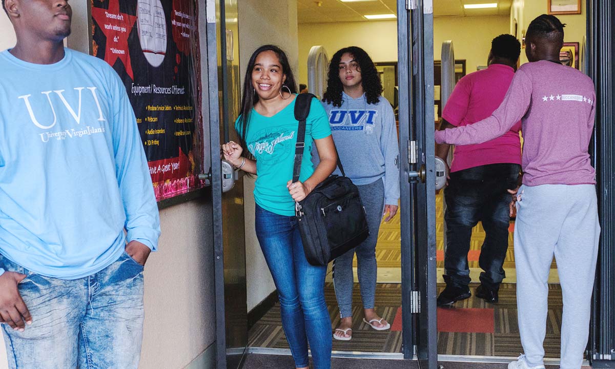 Students leaving building on AAS Campus