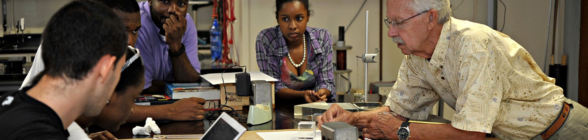 Students in science lab with professor