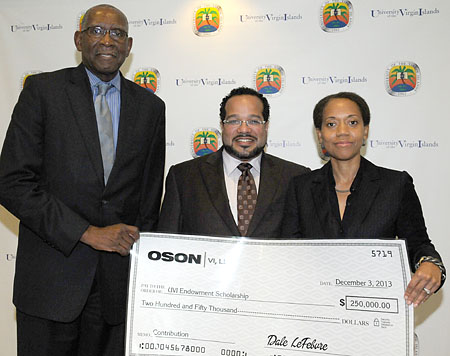 UVI President David Hall (left) and UVI Vice President for Institutional Advancement Dionne Jackson accept a donation from Oson VI, LLC Founder and Chairman Dale LeFebvre on Dec. 3, on UVI’s St. Thomas Campus. 