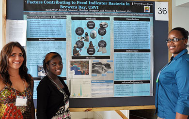University of the Virgin Islands Caribbean Exploratory Research Center students at a poster presentation.